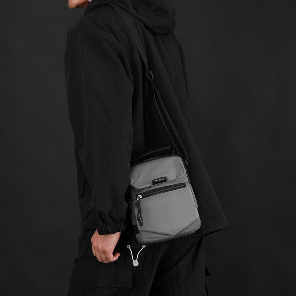 Vattentålig crossbody-väska – grå