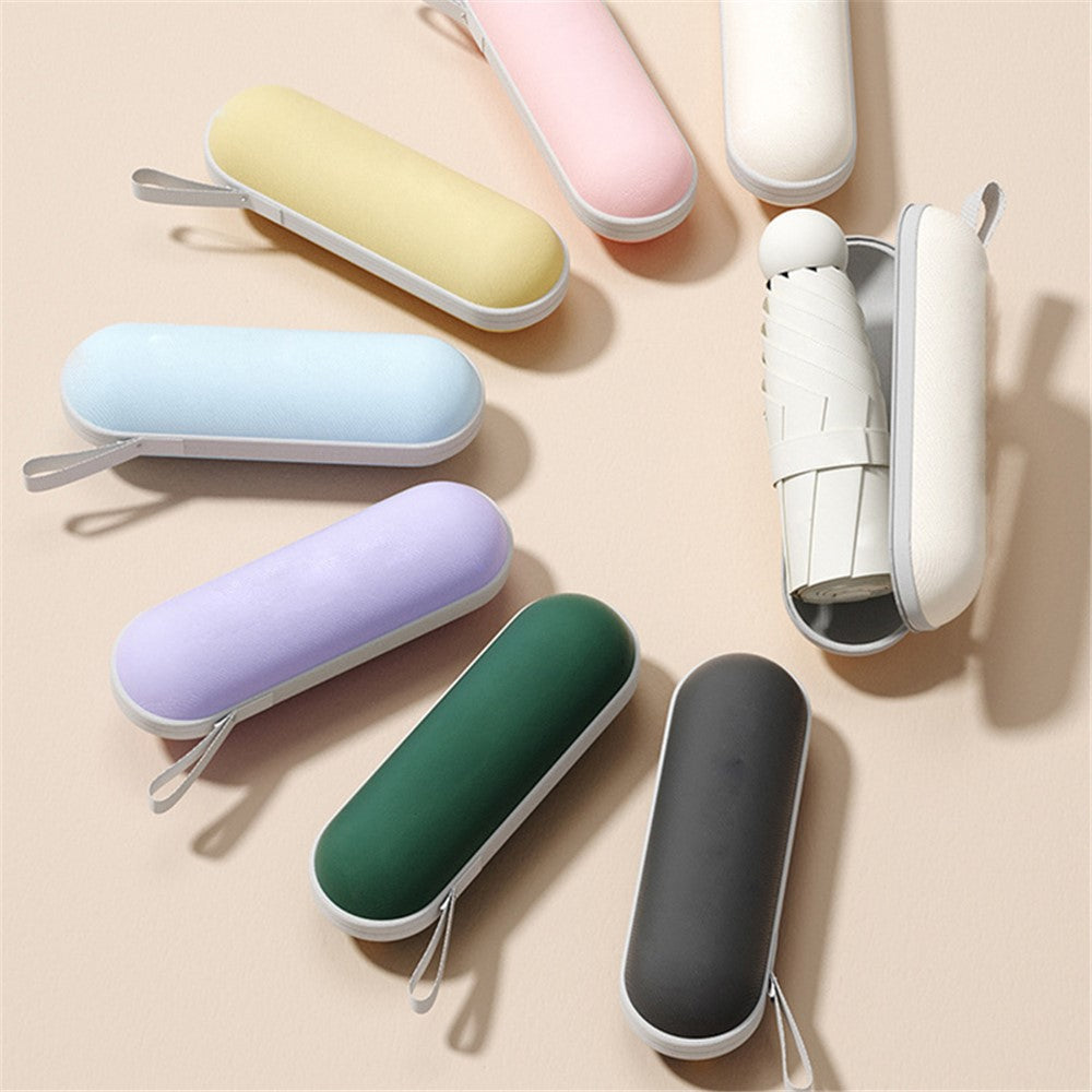 Fällbart mini-paraply – anti-UV med kapsel