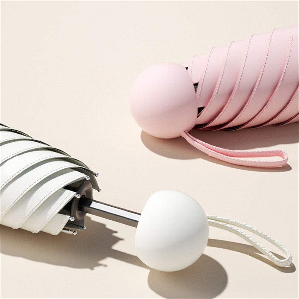 Fällbart mini-paraply – anti-UV med kapsel